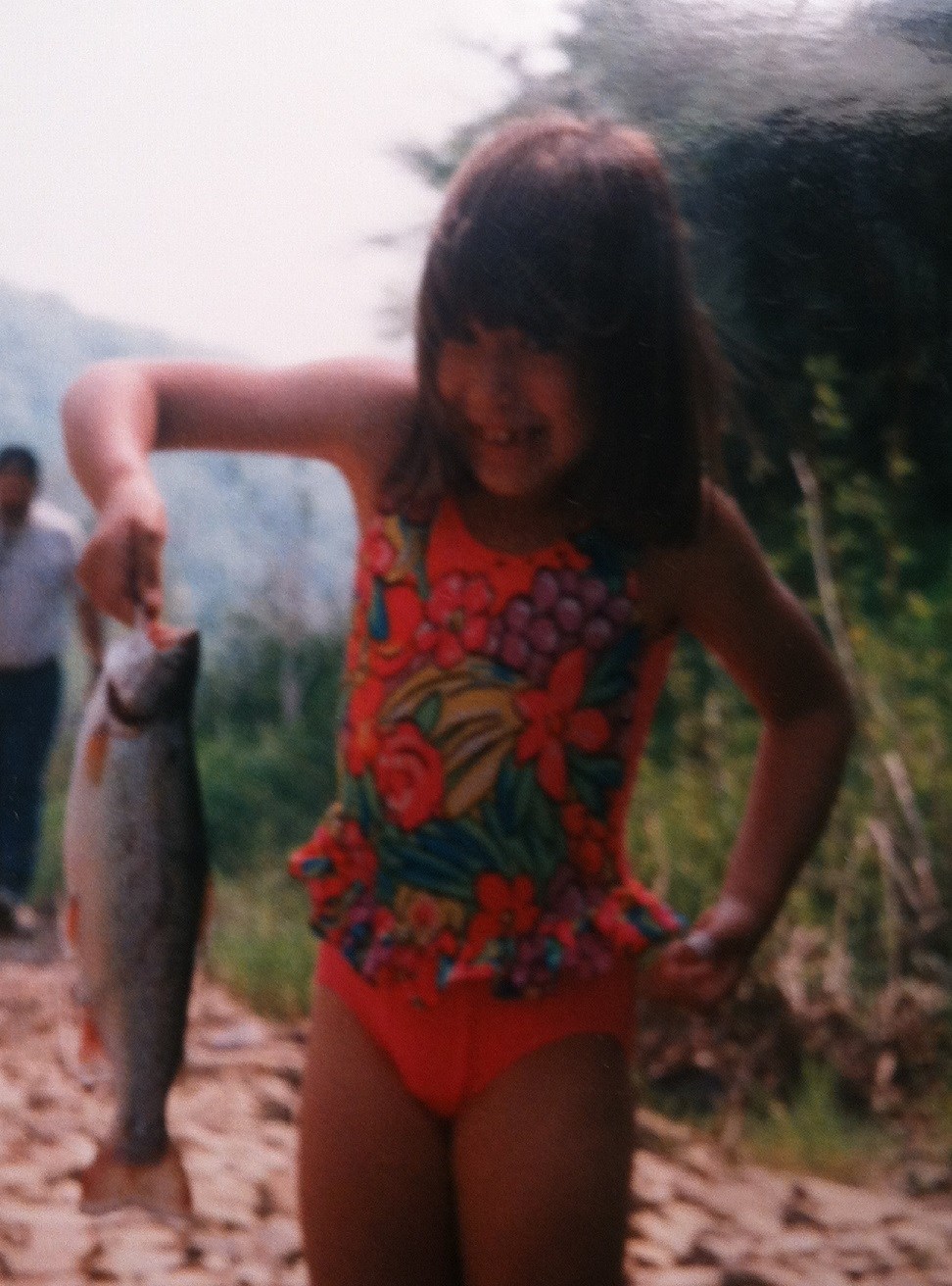 Anne with her first trout at age 6