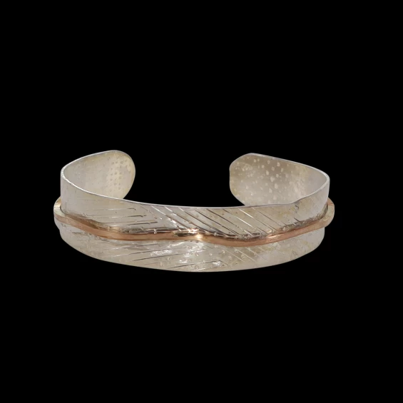 Women's pressed silver cuff with square gold filled overlay.