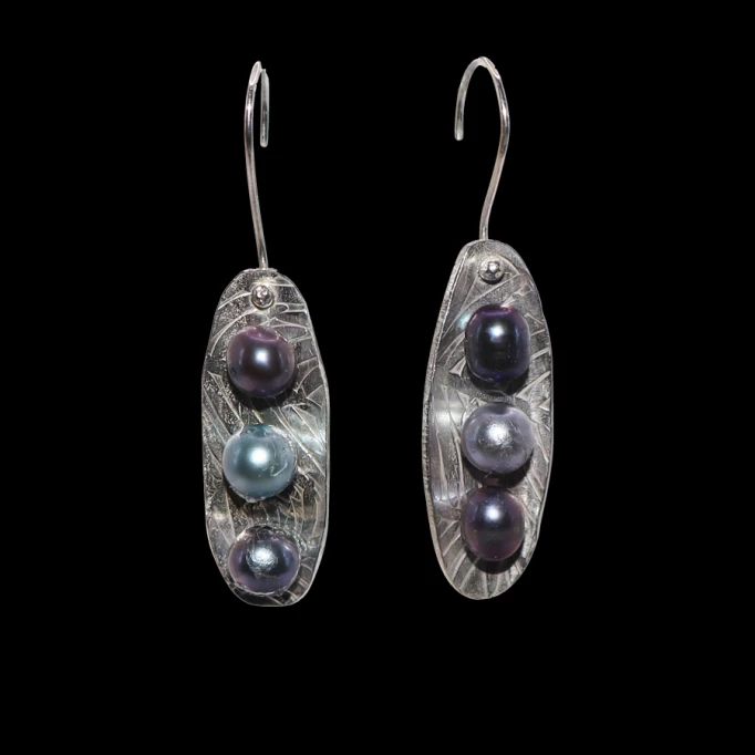 Fresh water pearls in sterling silver pods