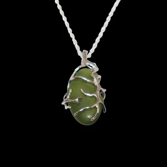 Green sea glass Necklace wrapped in silver branches