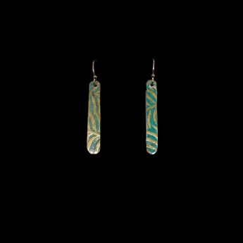 Dangling pressed brass earrings finished with a green patina wash