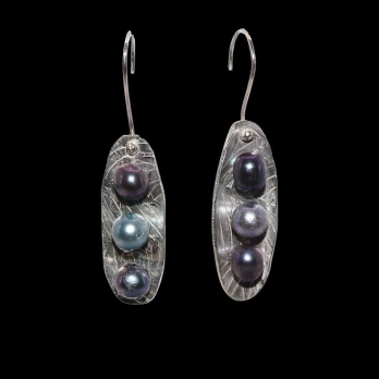 Fresh water pearls in sterling silver pods
