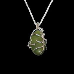 Green sea glass Necklace wrapped in silver branches