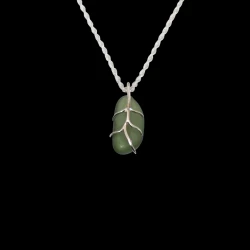 Small green sea glass wrapped in sterling silver branches