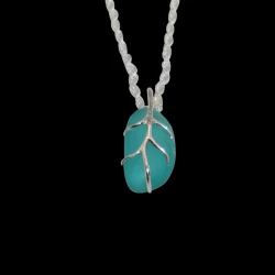 Gorgeous green sea glass wrapped in silver branches with sterling rope chain