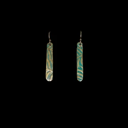 Dangling pressed brass earrings finished with a green patina wash